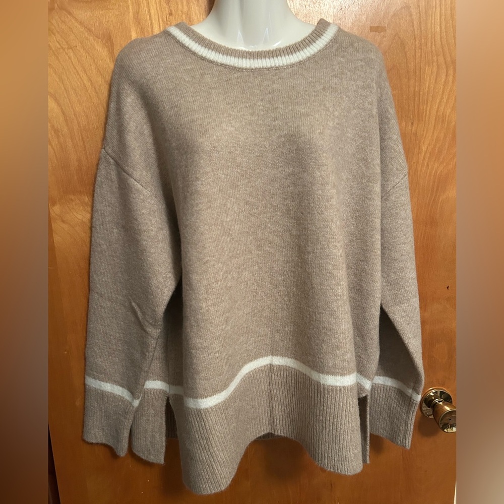 Cozy Beige Sweater with White Accents